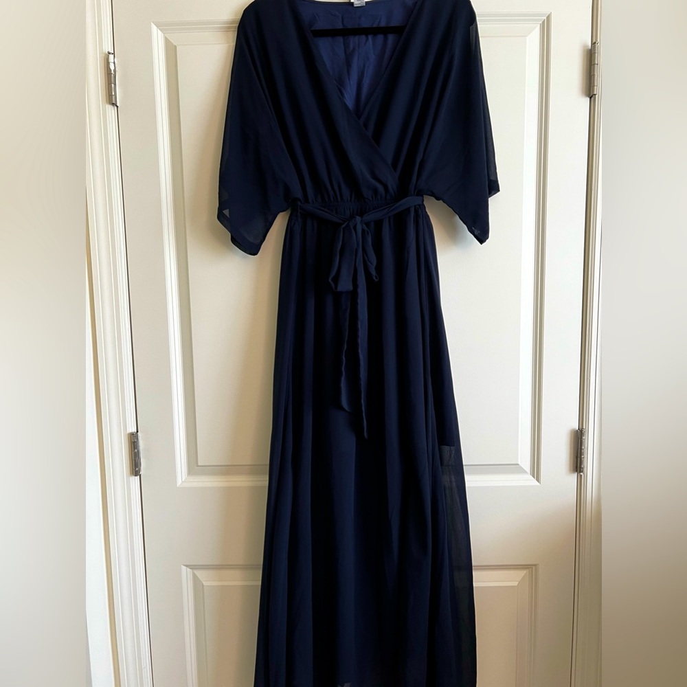 Full length navy blue short sleeve maxi dress.